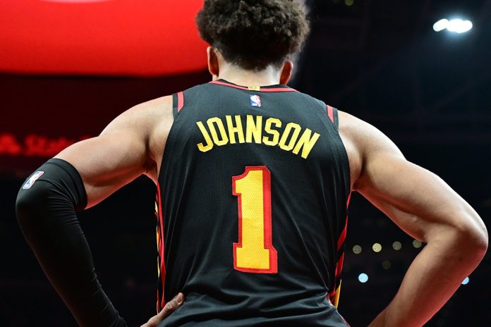 Hawks outgun 76ers 117-107 behind Johnson and McCollum 