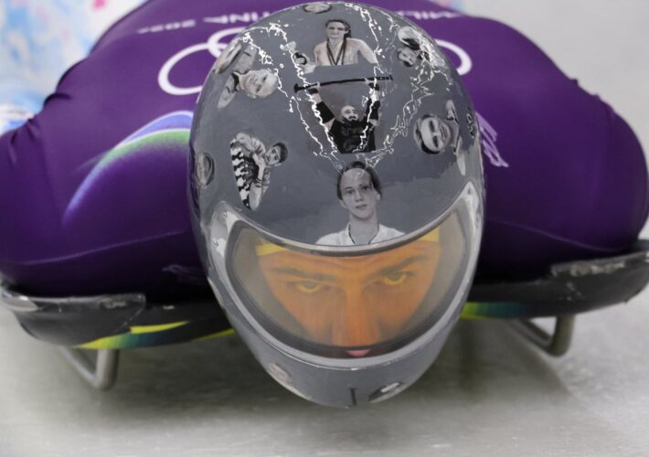 Ukrainian skeleton racer wears helmet paying tribute to athletes killed in Ukraine-Russia war at Winter Olympics