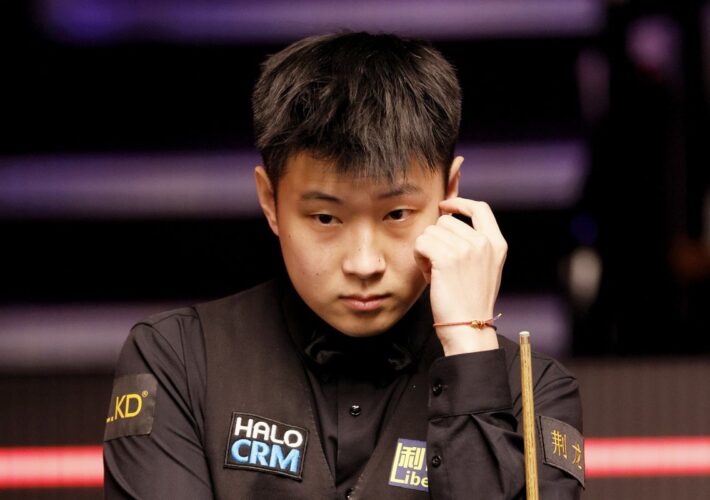 Zhao Xintong kicks off World Championship defence by edging past Liam Highfield