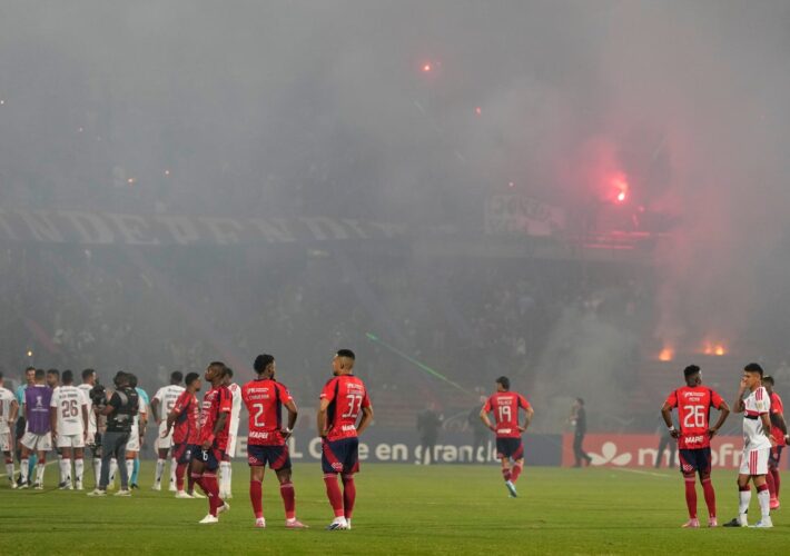 Copa Libertadores match abandoned after crowd trouble breaks out