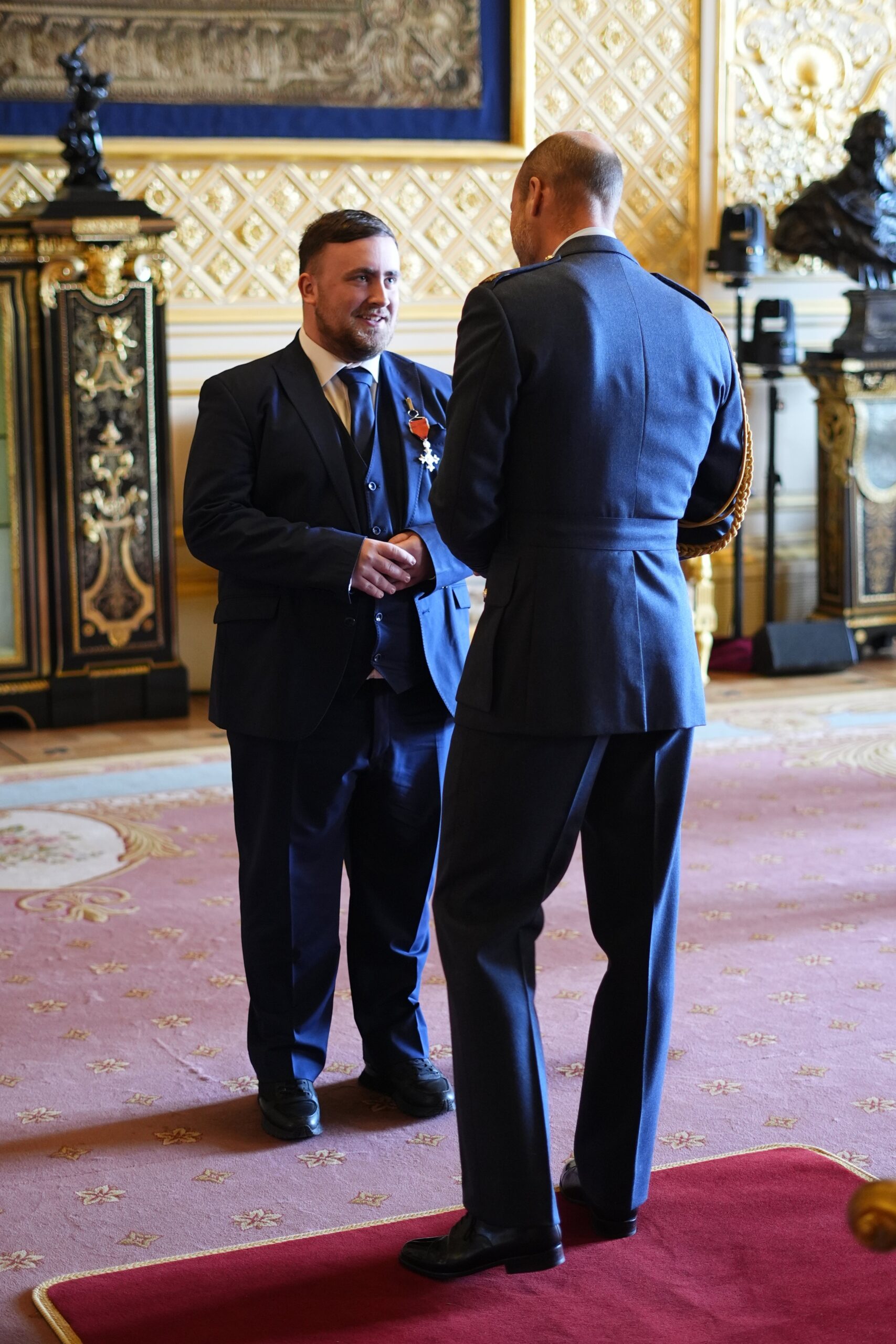 Luke Littler offers Prince William World Darts Championship tickets at Alexandra Palace after receiving MBE