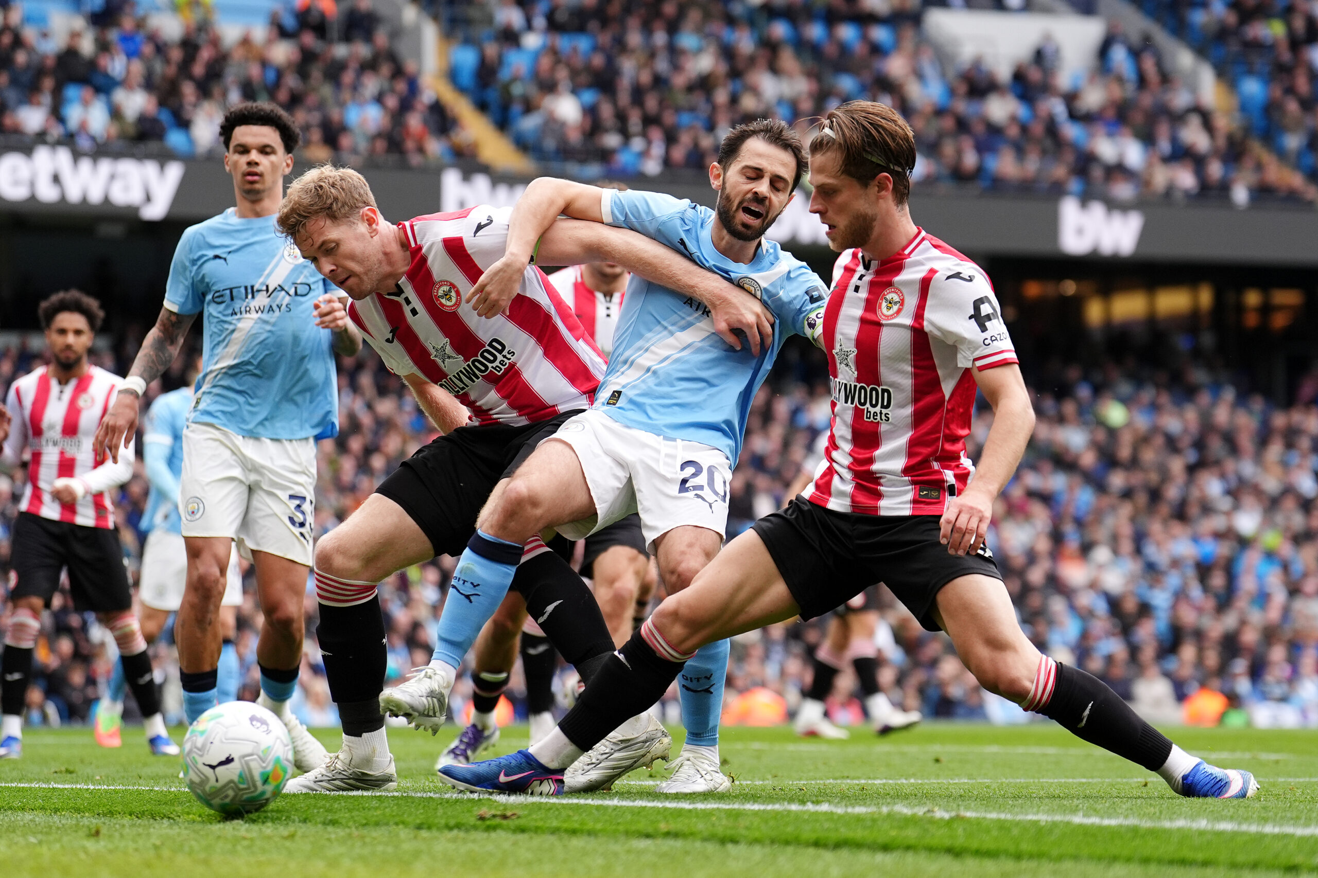 ‘Ridiculous’ – Arsenal fans fume as Bernardo Silva escapes red card after lashing out at Brentford star