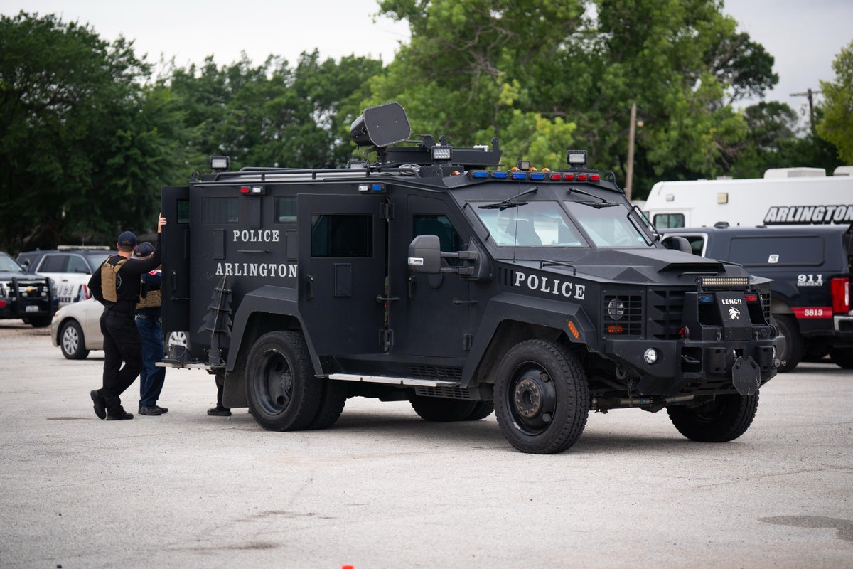 Swat team and armed officers deployed during police incident near England World Cup venue