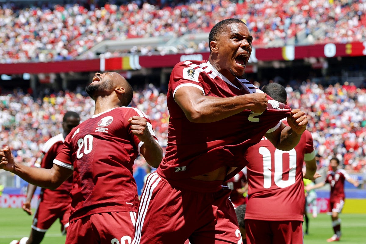 Qatar stun Switzerland late on to snatch first ever World Cup point