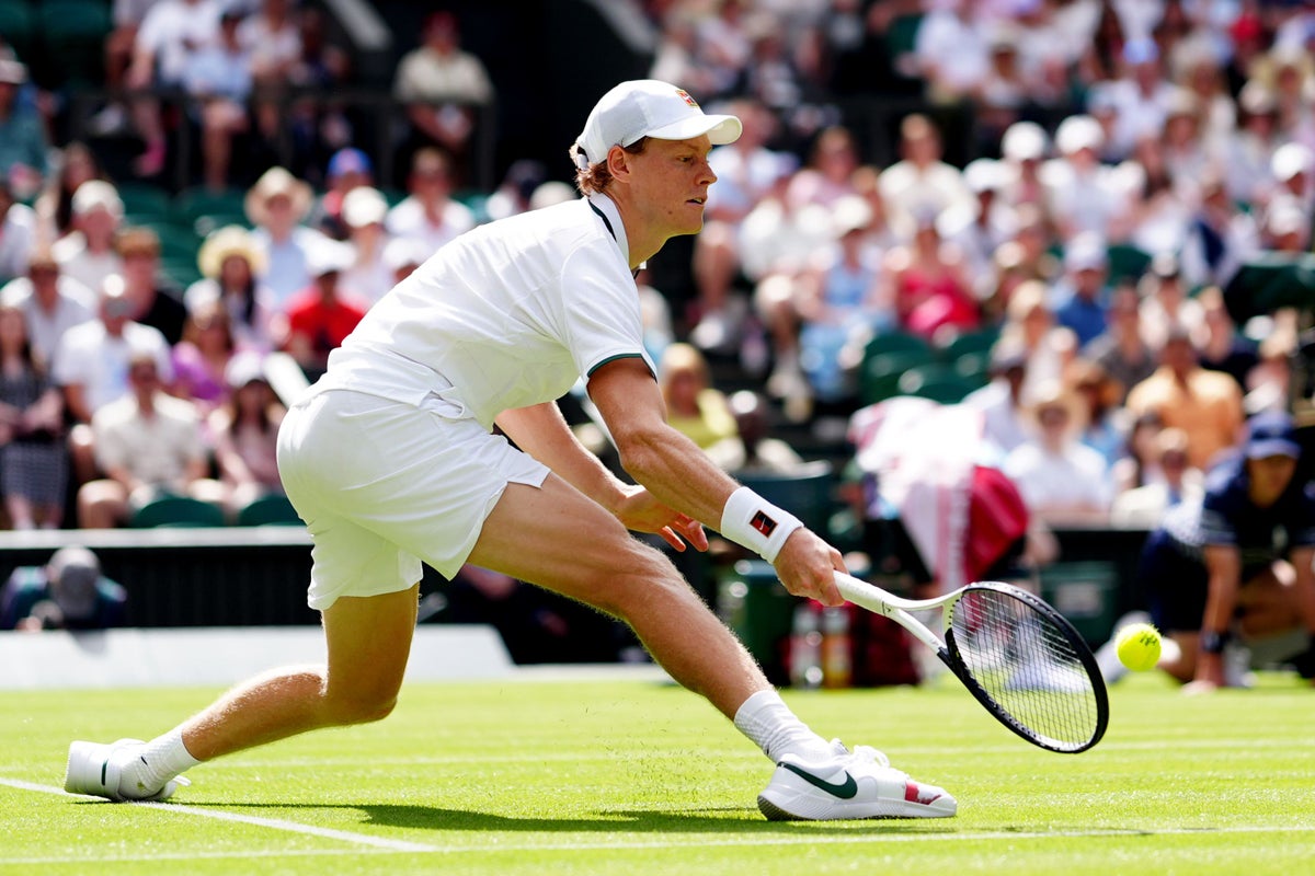 Jannik Sinner bloodied as he survives scare in fierce five-set Wimbledon opener