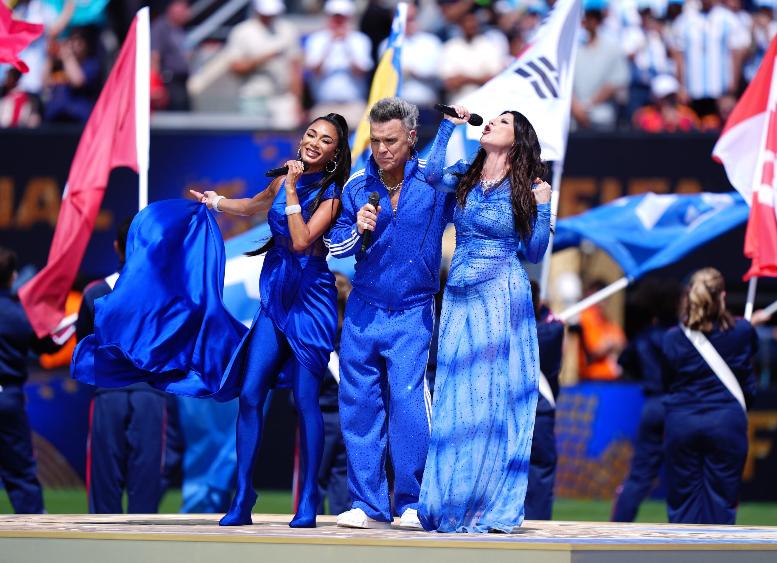 Robbie Williams addresses World Cup final TV incident after white object falls from mouth