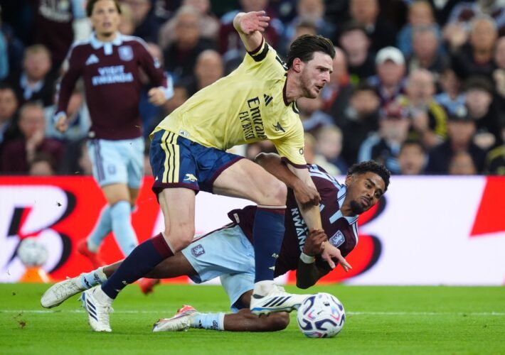 Arsenal sweat double injury blow as Declan Rice limps off at Aston Villa