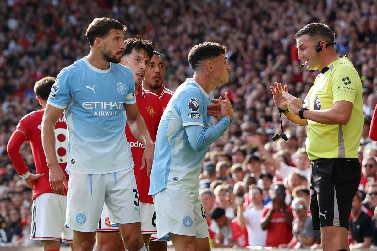Phil Foden sent off in Manchester derby for wild kick on Bruno Fernandes
